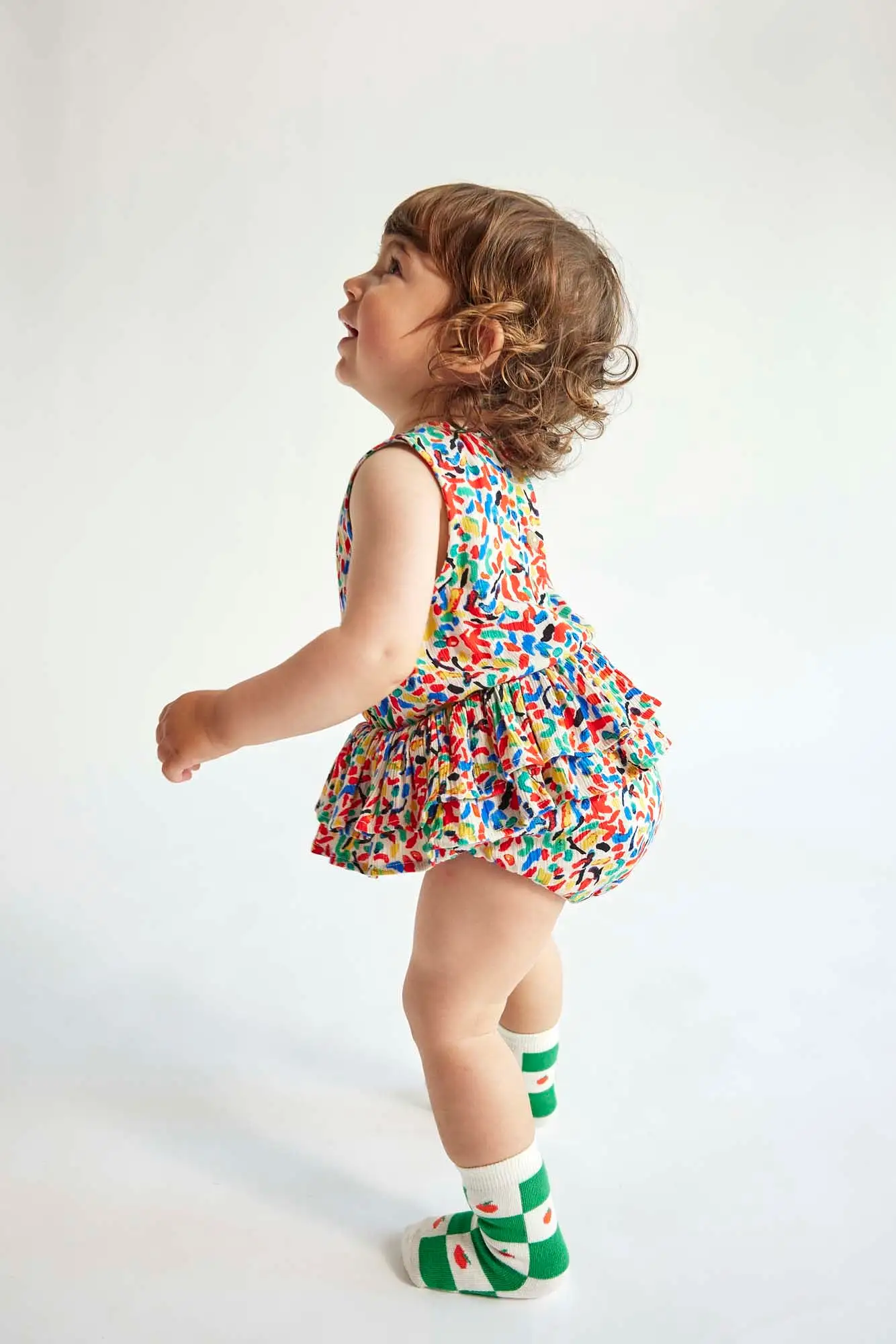 Confetti All Over Ruffle Woven Baby Romper